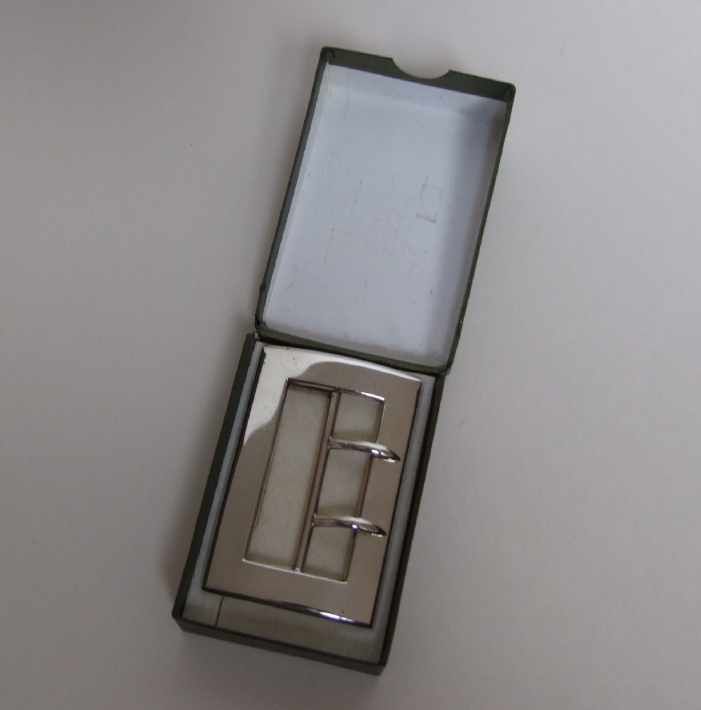 A stylish George V silver belt buckle.