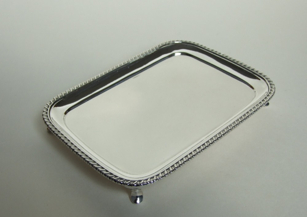 A handsome small silver card tray/salver.