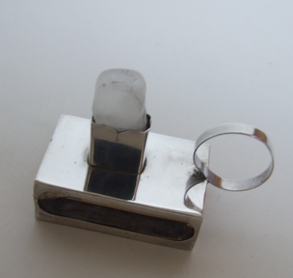 An Extremely rare silver matchbox and sealing wax holder.