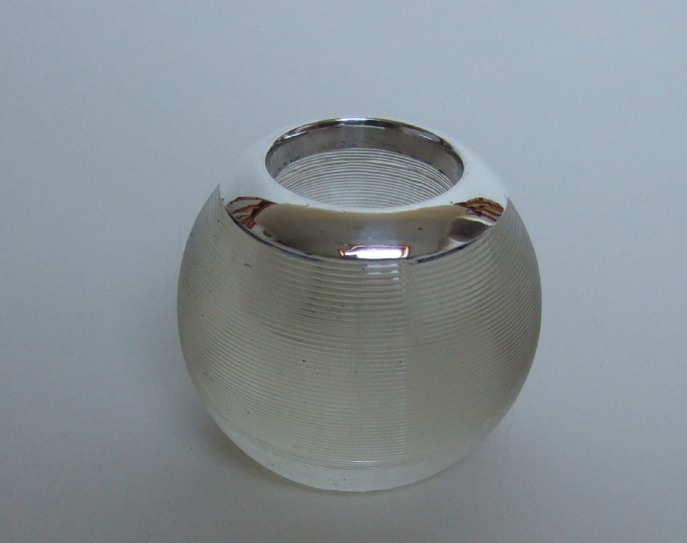 A handsome Edwardian silver mounted match striker.