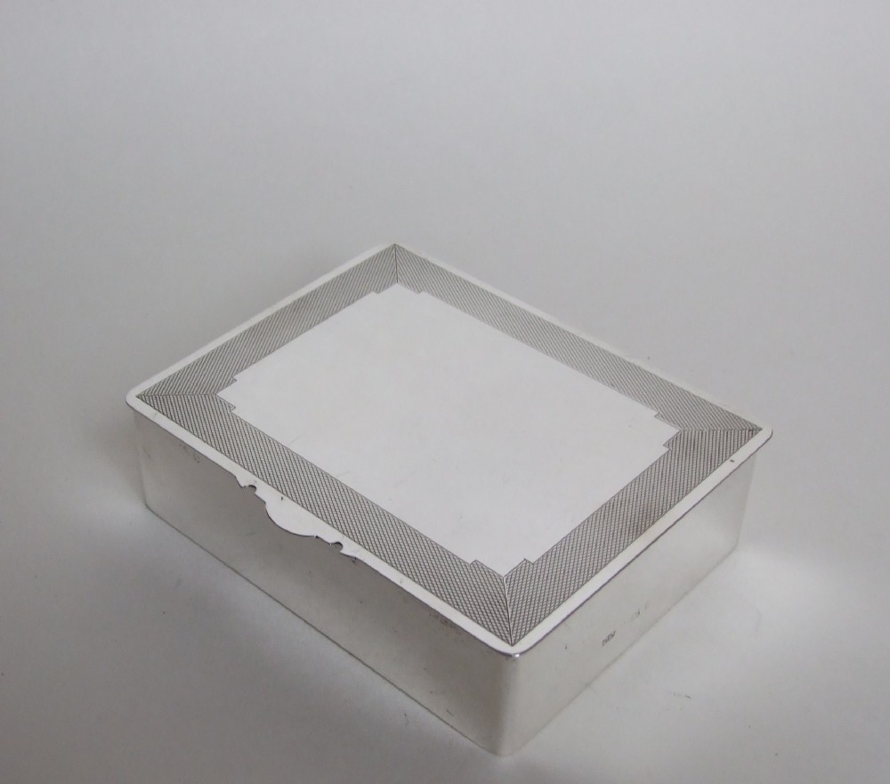 A fabulous Art Deco silver cuff links box.