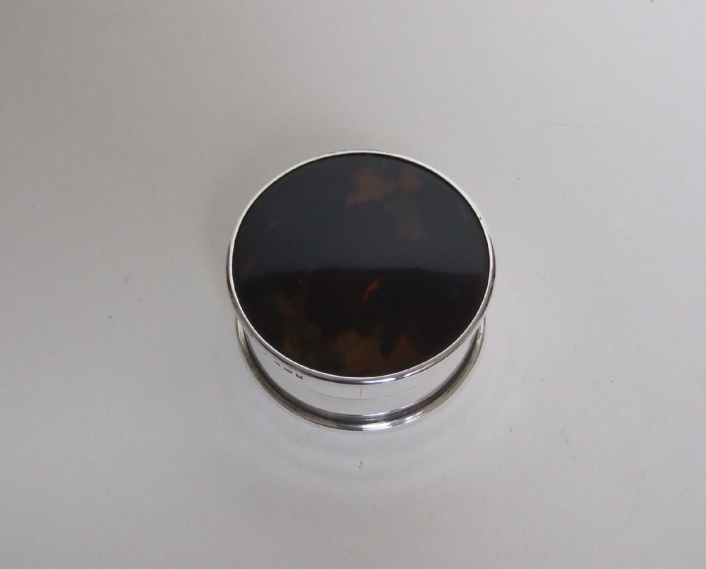 A very large silver & tortoiseshell pillbox.