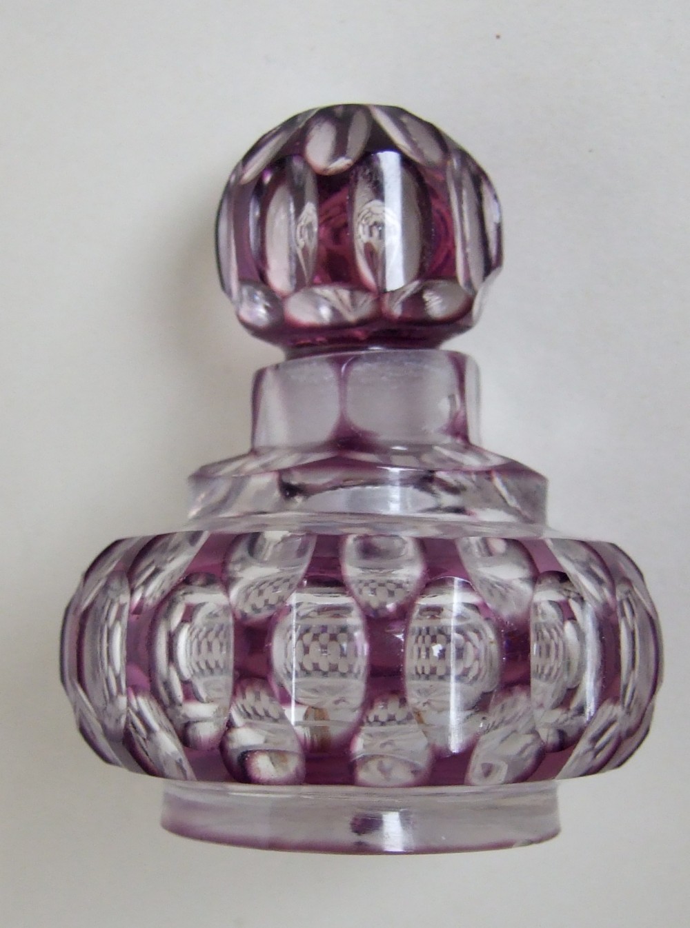 A gorgeous Victorian amethyst cut through scent bottle.