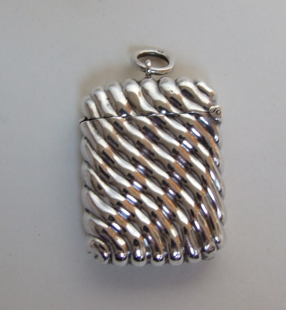 An unusual Victorian silver vesta, with gilded interior.
