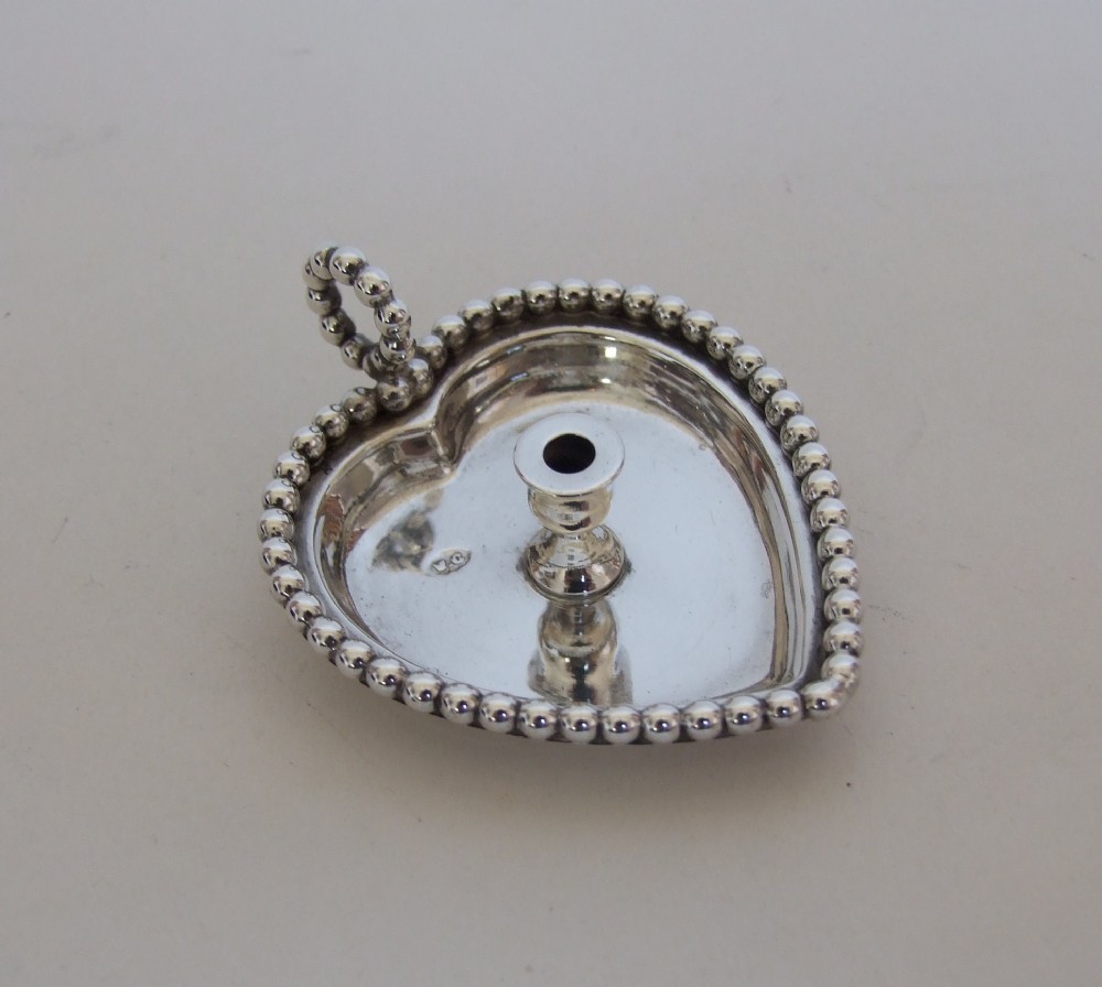 A wonderful Victorian silver miniature go-to-bed.