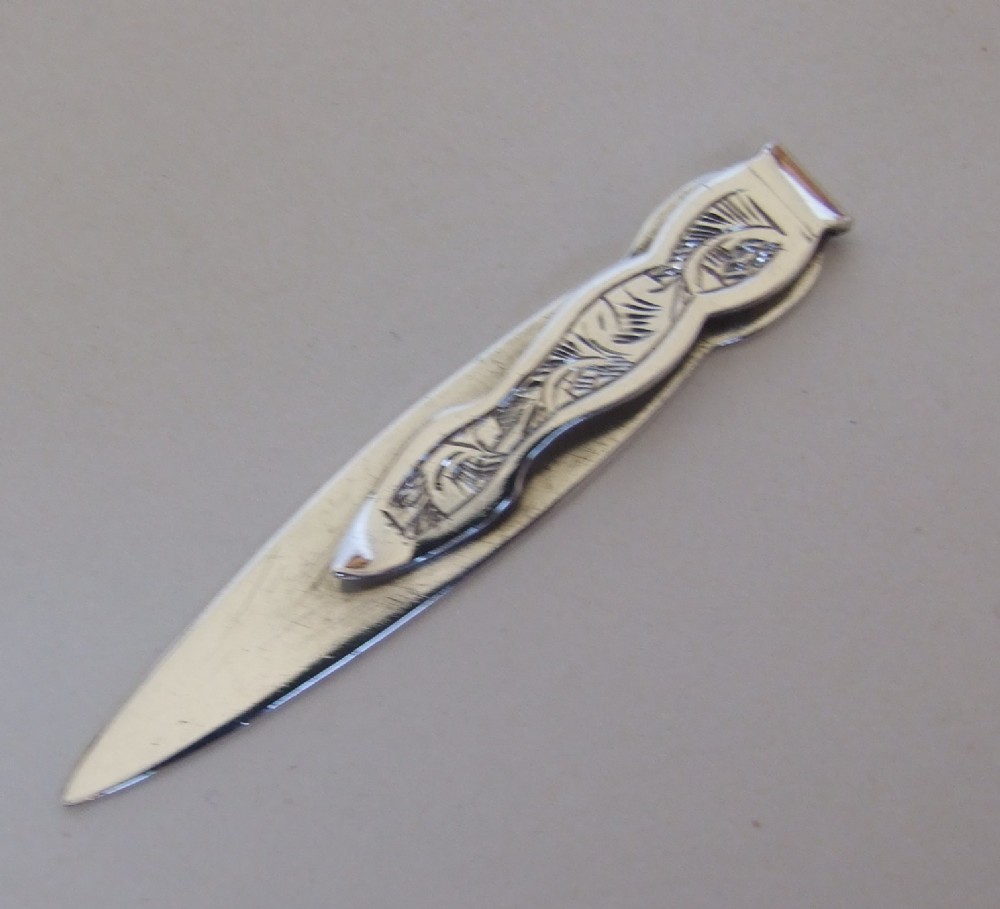 A charming George V silver bookmark.
