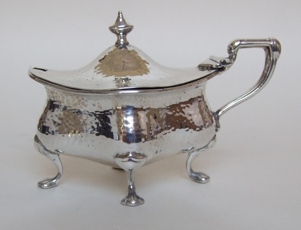 A stylish Arts & Crafts Edwardian silver mustard pot.