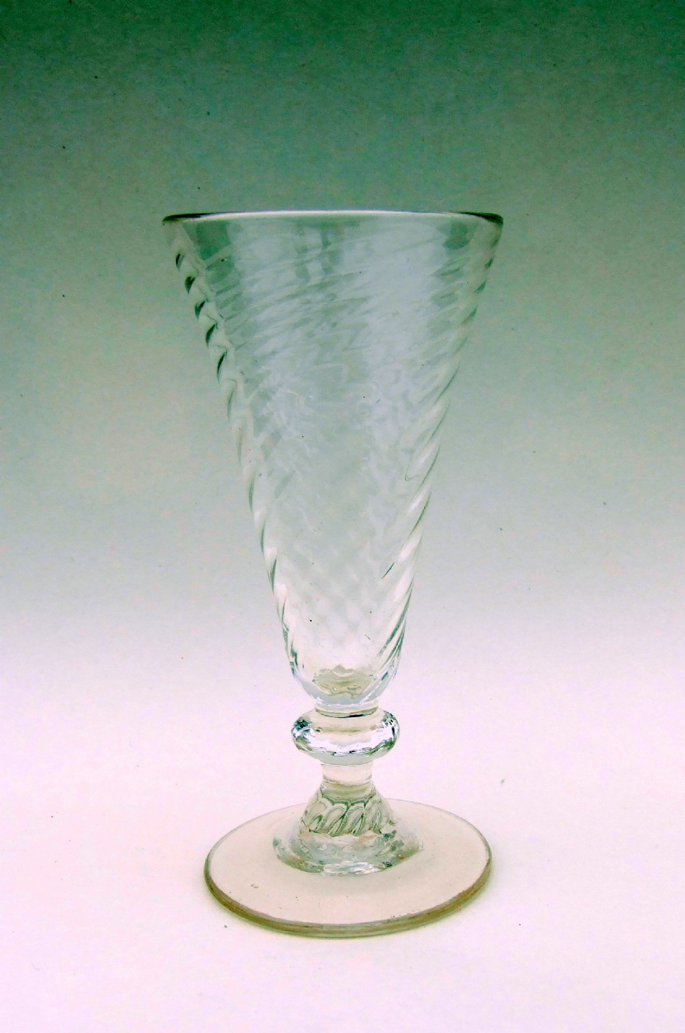 An 18th Century wrythen dwarf ale glass.