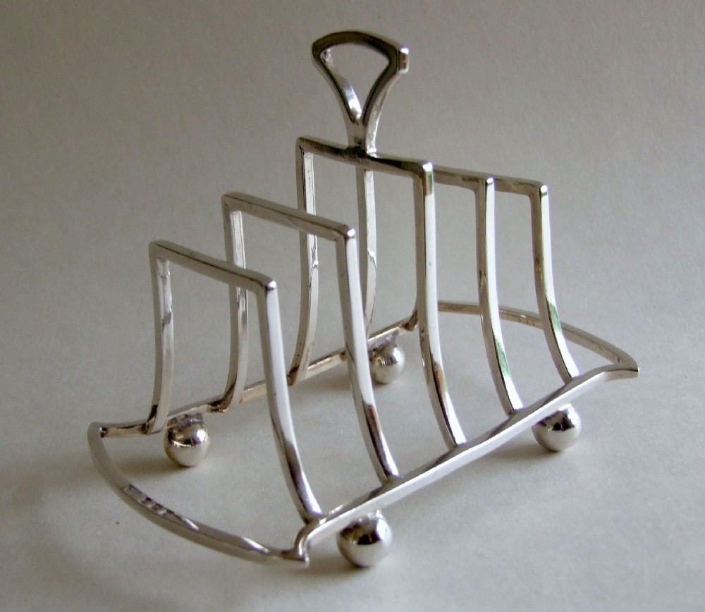 An attractive Art Deco silver toastrack.