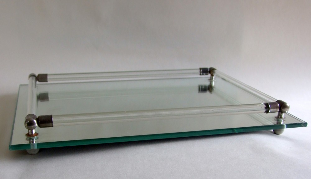 A stylish Art Deco mirror stand.