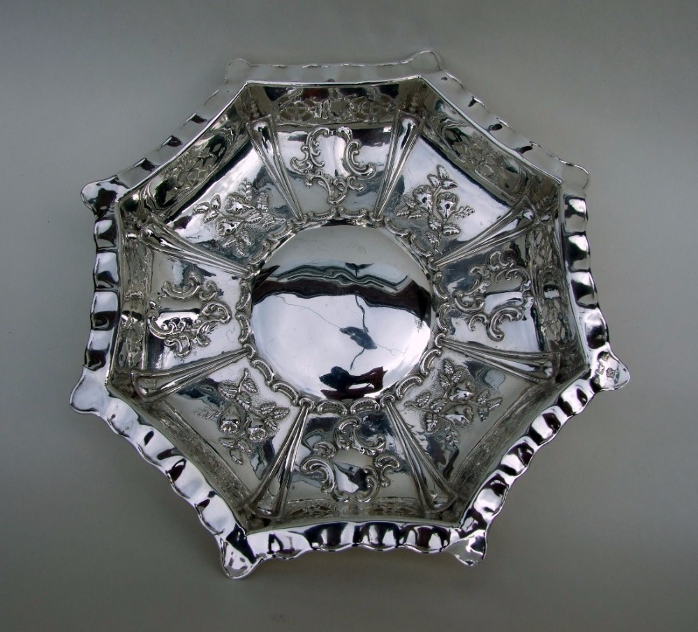 An appealing Edwardian pierced silver fruit bowl.