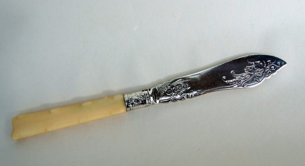 A gorgeous Victorian silver butter knife.
