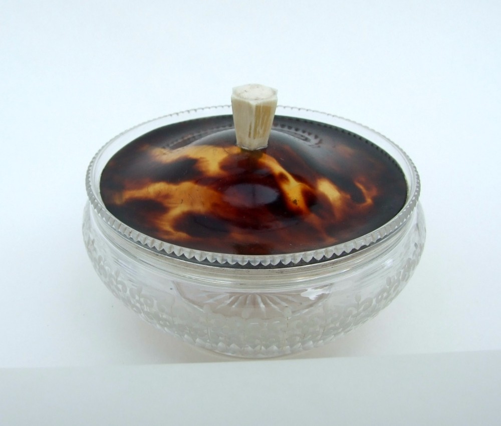 A Goerge V silver & tortoiseshell lidded powder bowl.