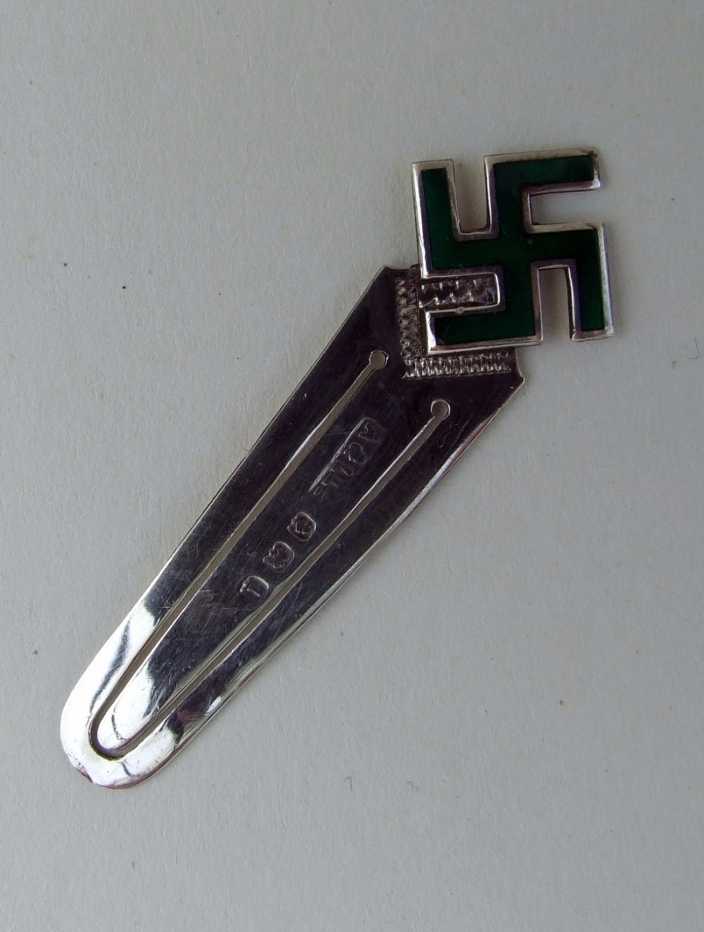 A rare Edwardian 'good luck' silver swastika bookmark.