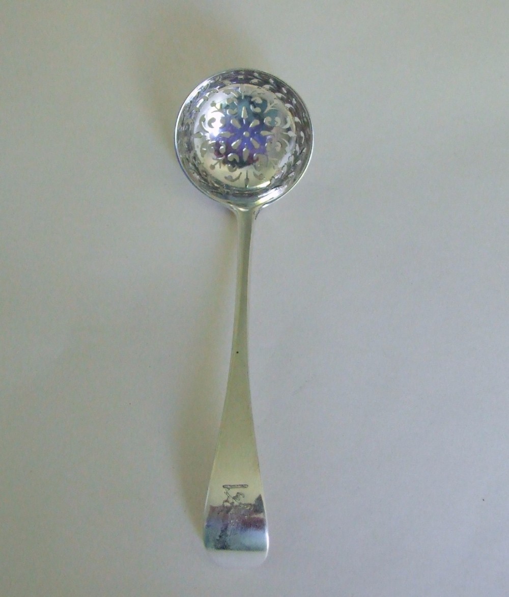 A Victorian silver sifter spoon by George Adams.