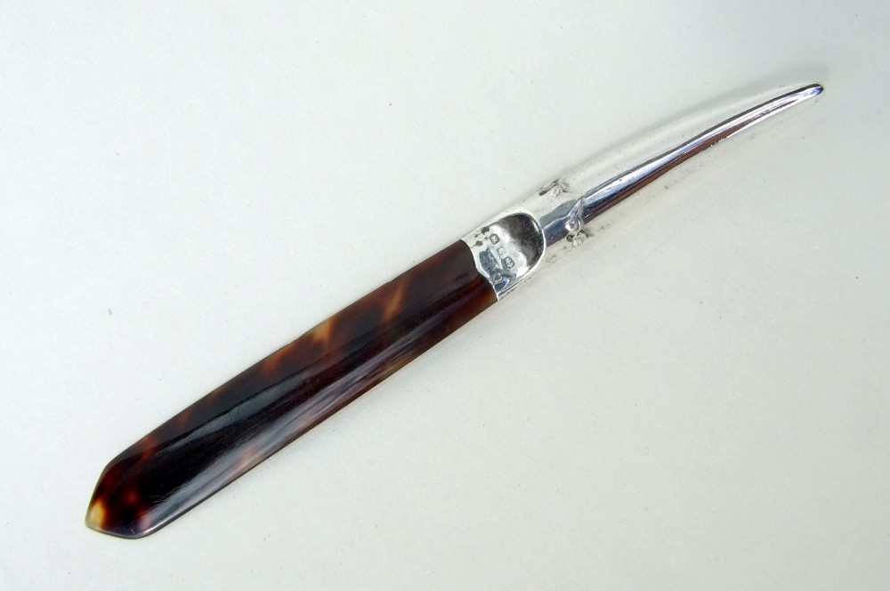 A Victorian silver & tortoiseshell letter opener.