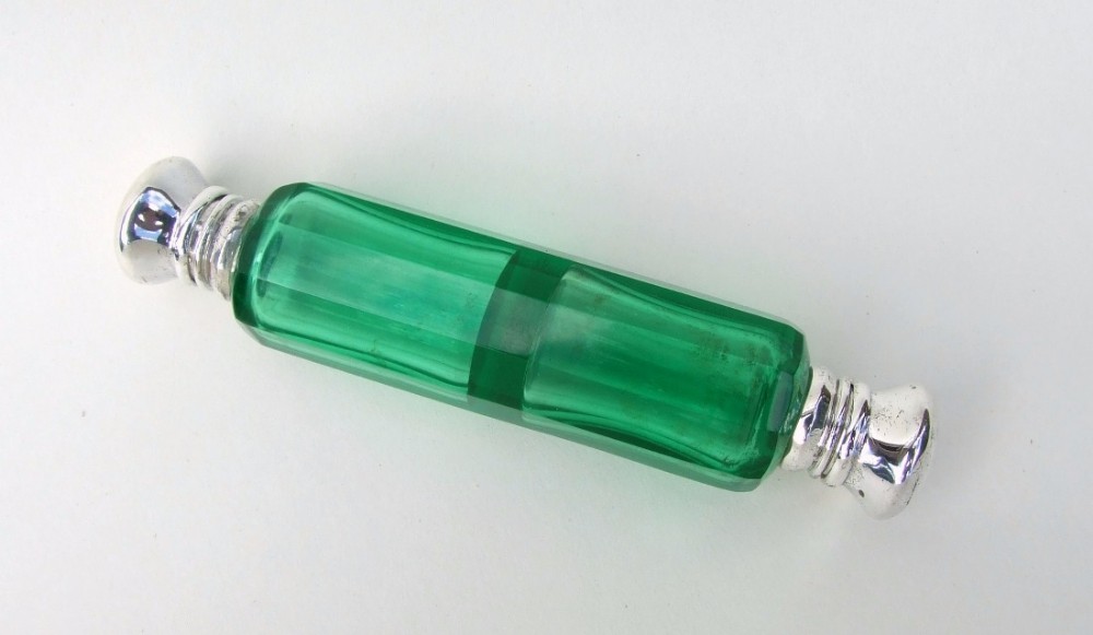 A fabulous Victorian silver mounted double ended uranium scent bottle