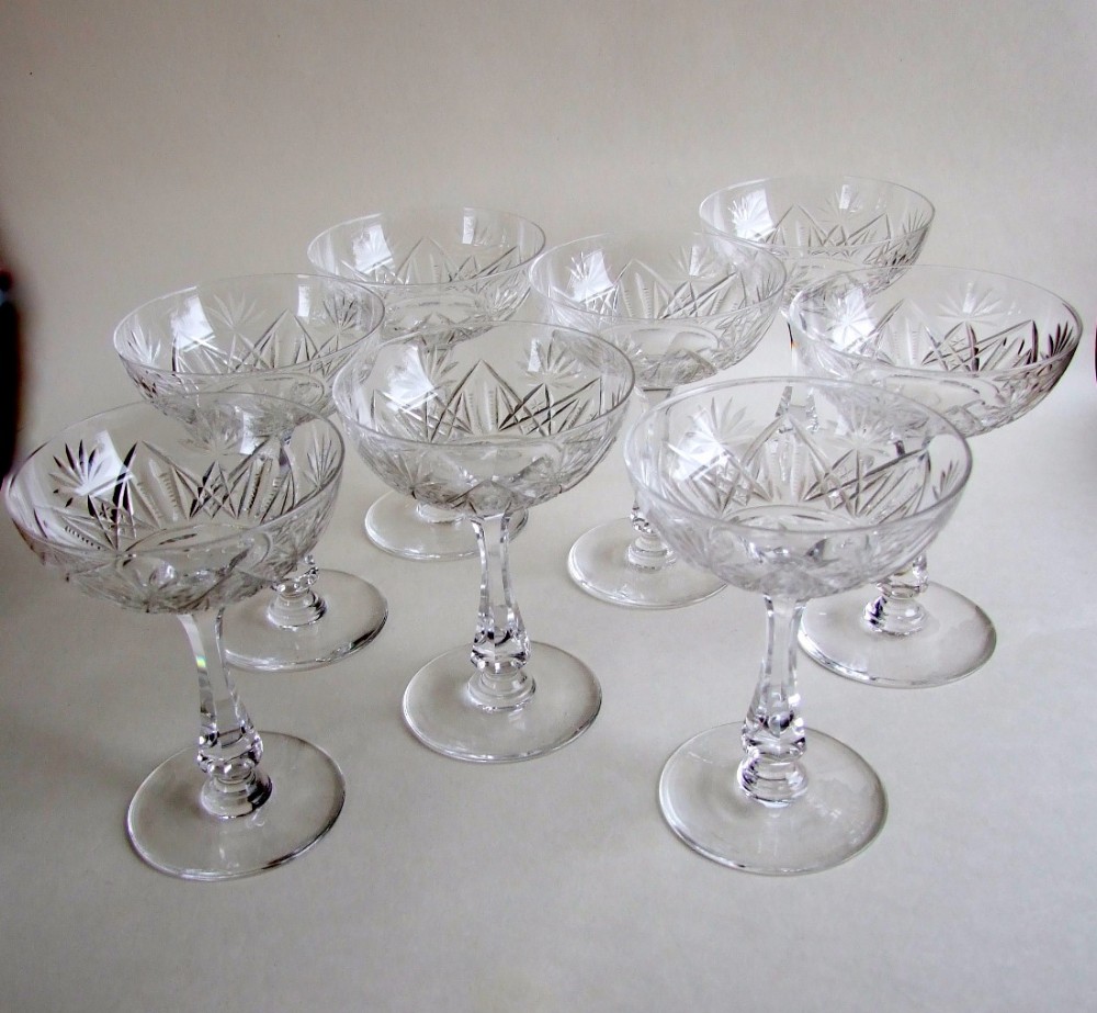A fabulous set of eight Edwardian cut glass champagne bowls.
