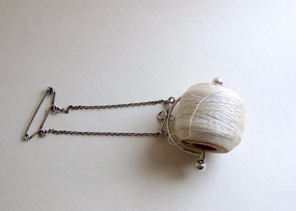 A rare early George V silver cotton holder . Sewing interest.