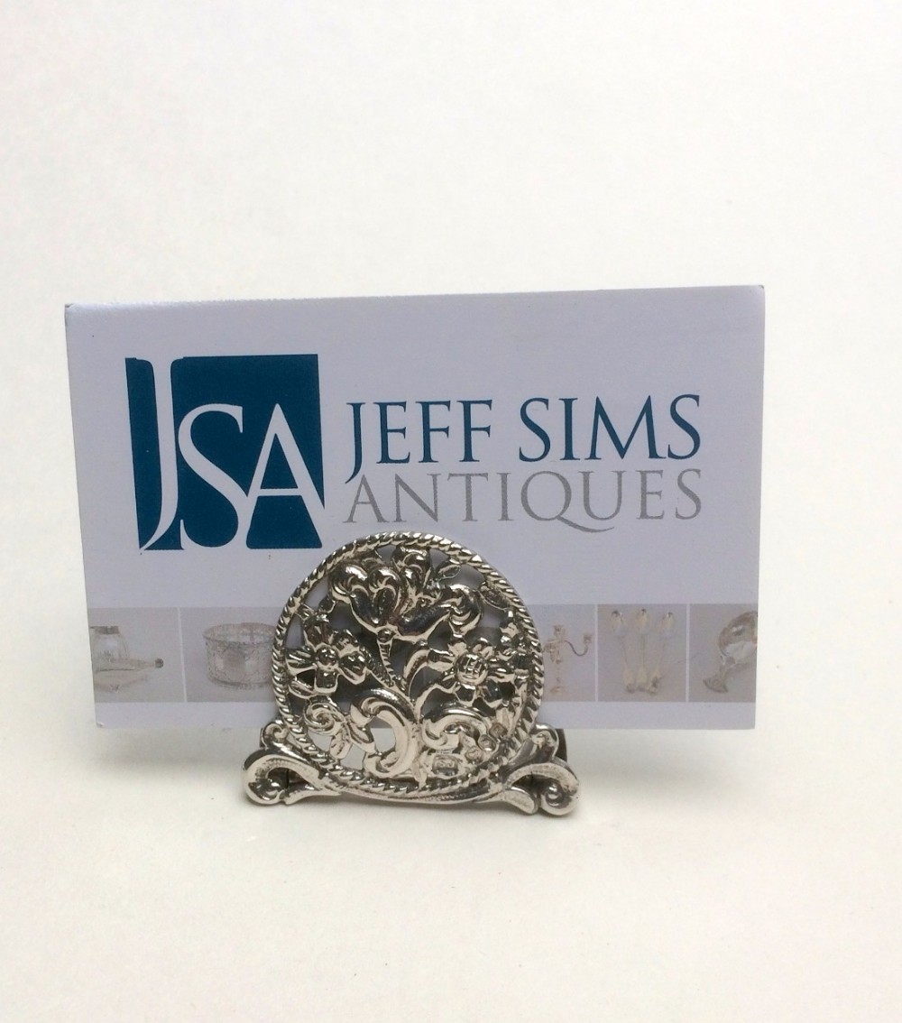 An Edwardian silver card/menu holder.