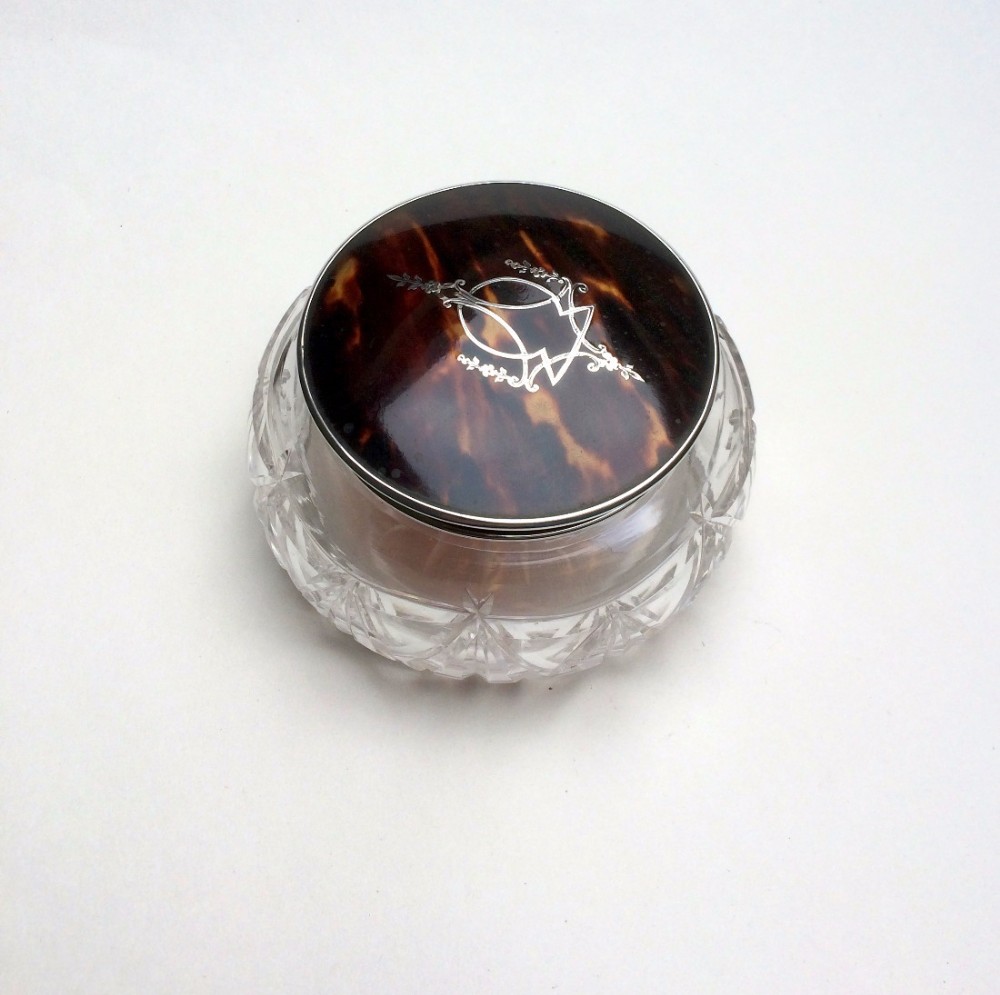 A George V silver & tortoiseshell powder bowl.