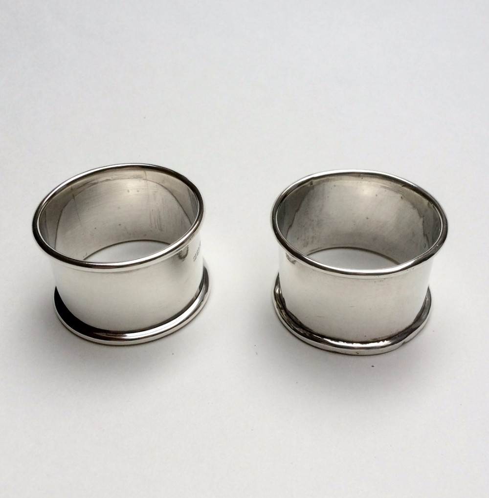 A pair of George V silver napkin rings.
