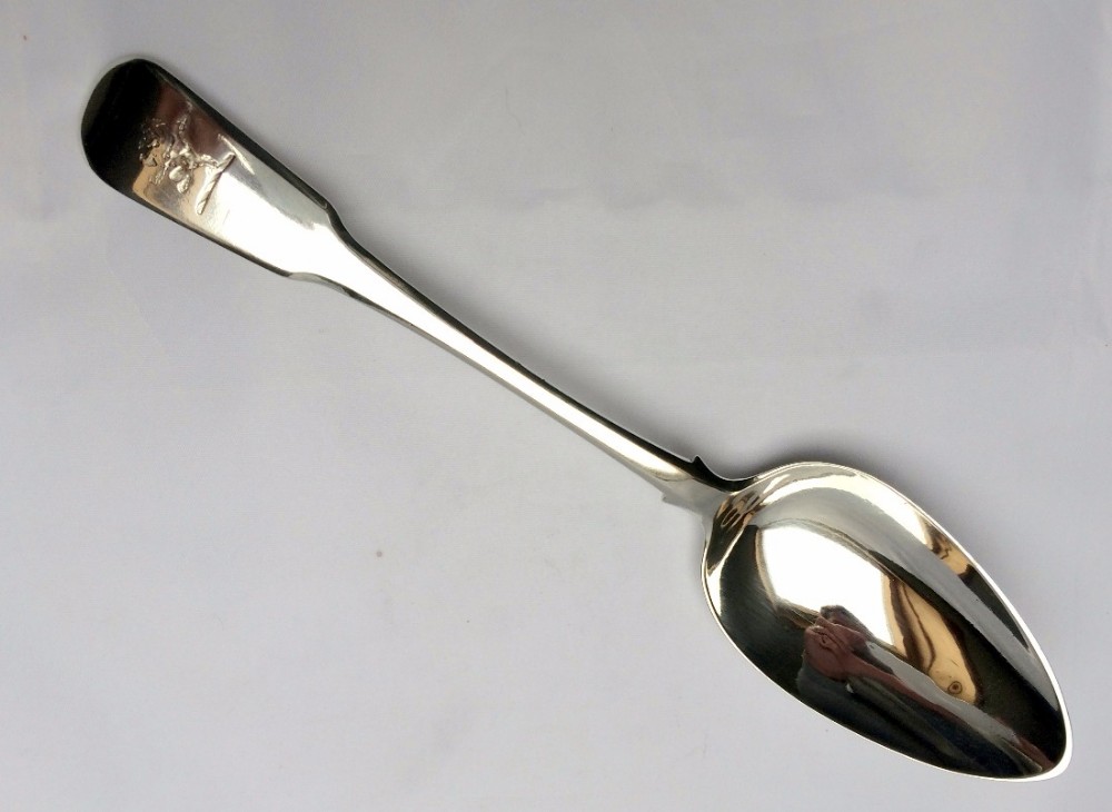 An Exeter Georgian silver serving spoon.