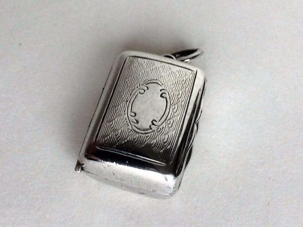 A charming miniature Victorian silver vinaigrette by George Unite.