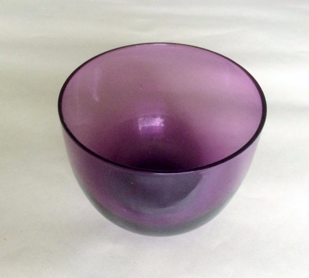 An early Victorian amethyst glass finger bowl.