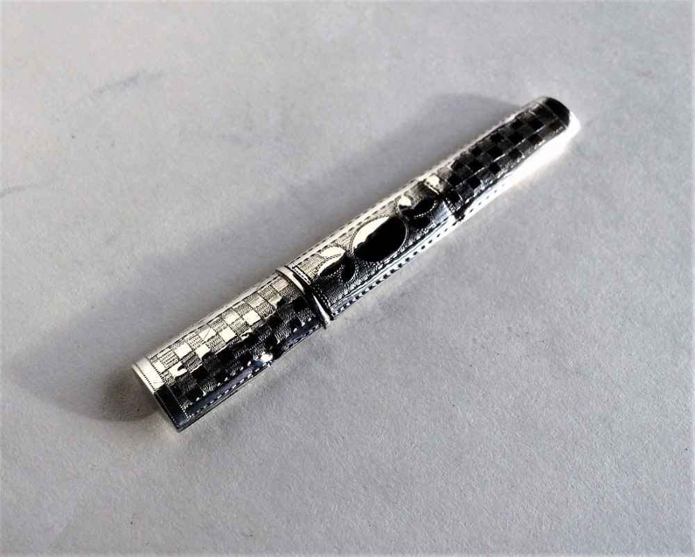 A Samuel Penbeton Georgian silver needle case.