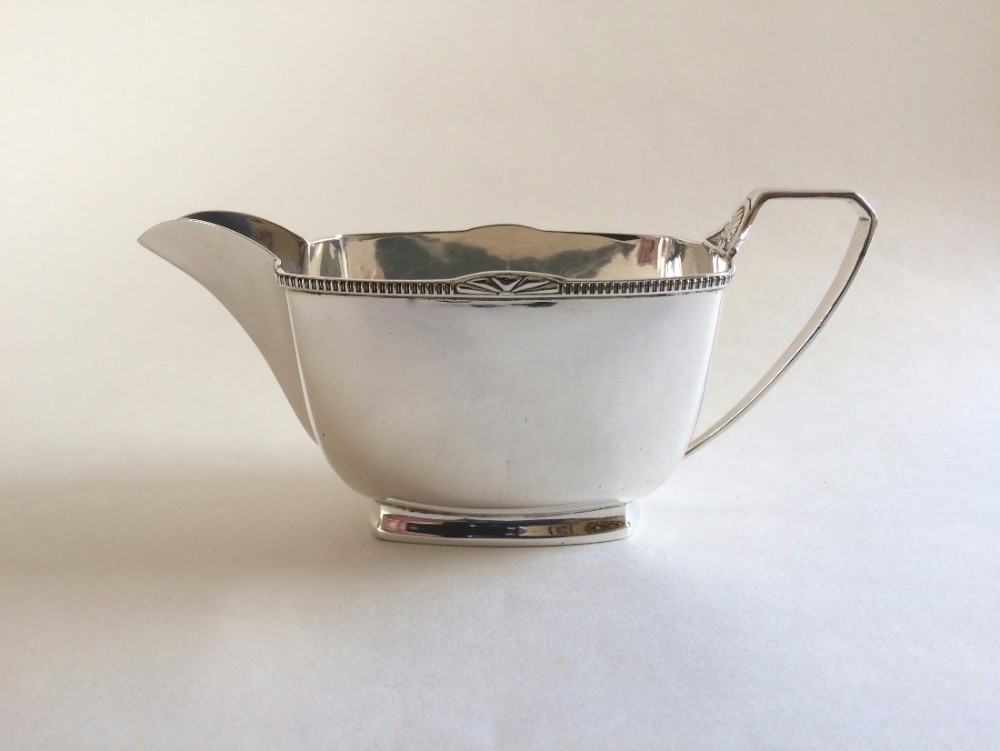 A handsome Art Deco silver gravy boat.