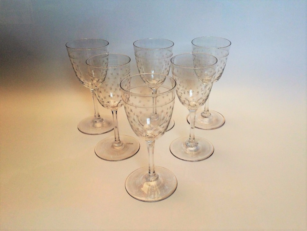 A gorgeous set of six Victorian star engraved sherry glasses.