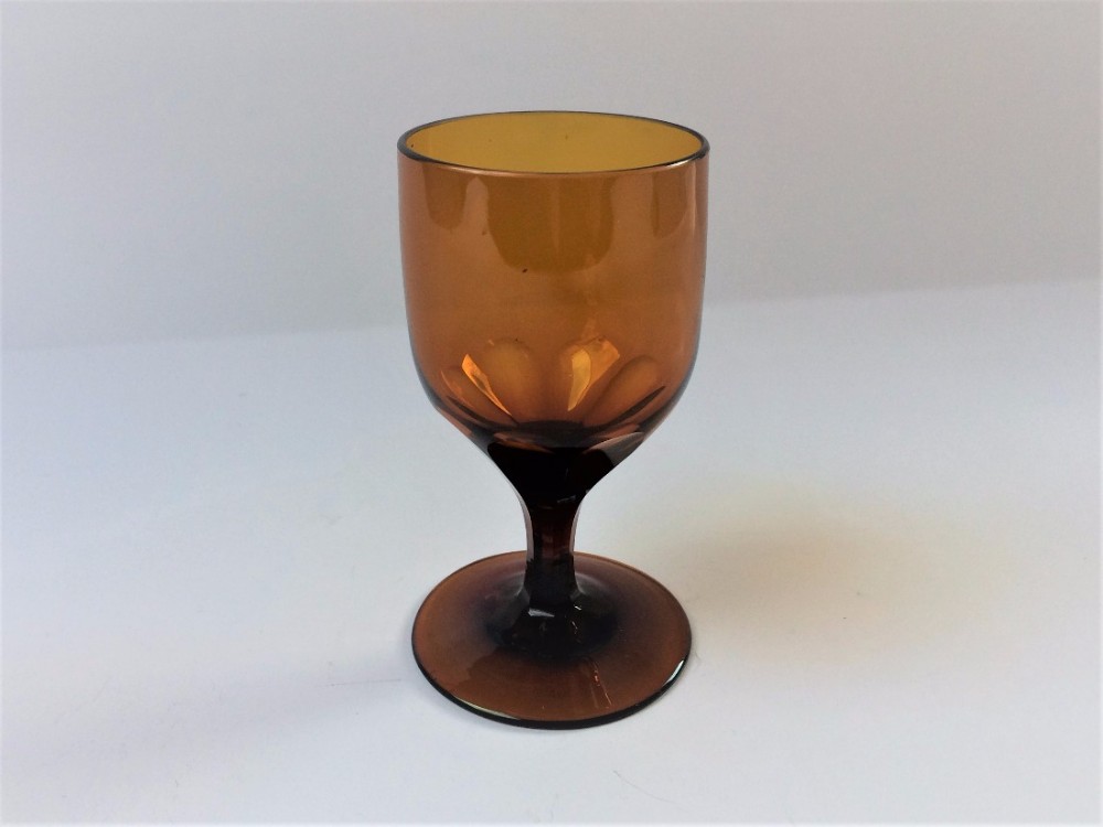 A rare Georgian amber wineglass.