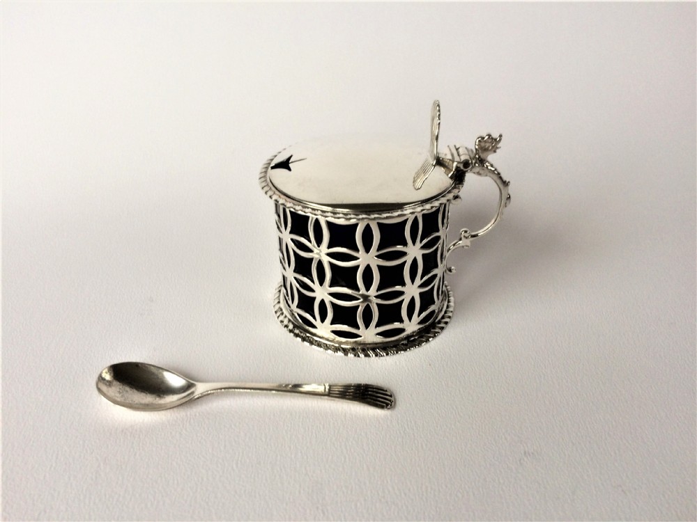 A splendid pierced Edwardian silver drum mustard pot.