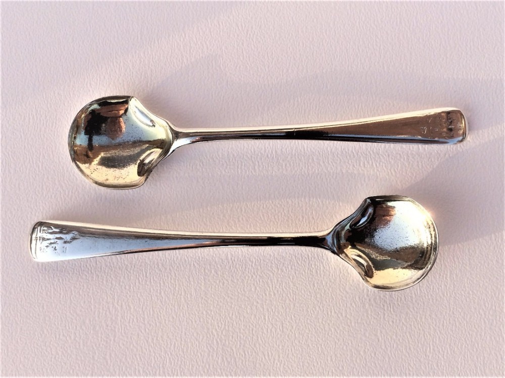 An unusual pair of Georgian silver condiment spades.