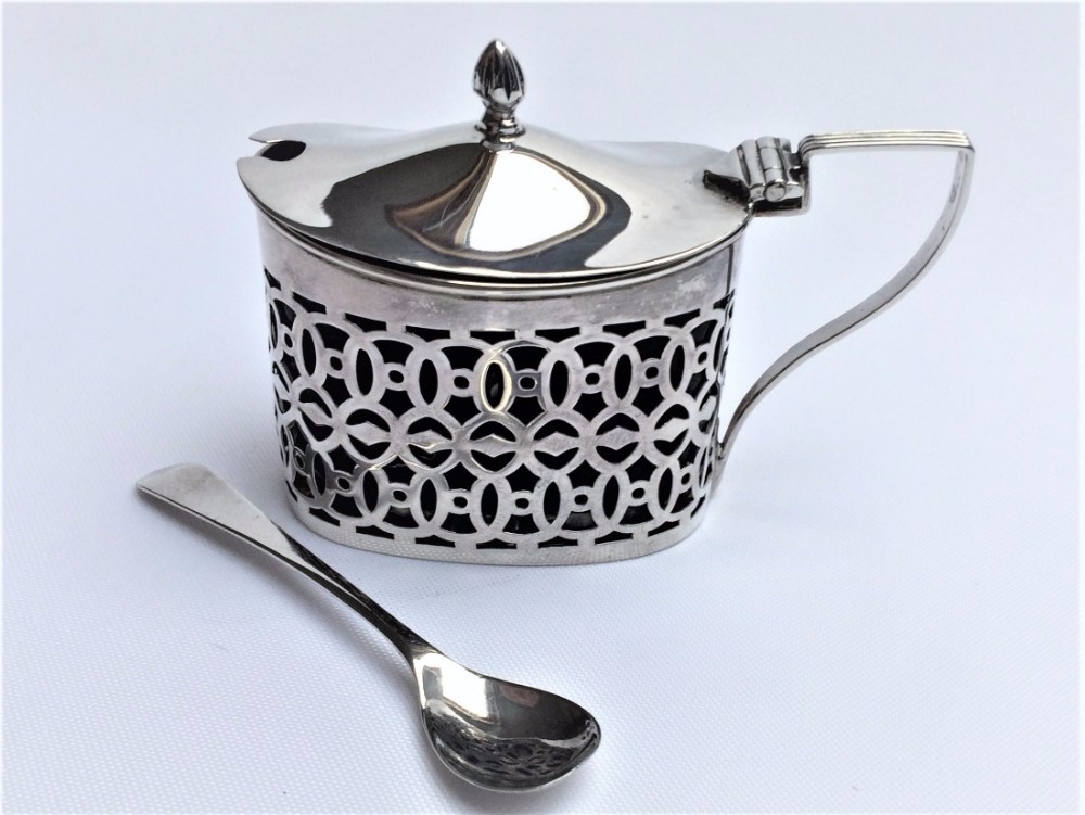 An unusual Edwardian silver & amethyst mustard pot and spoon.
