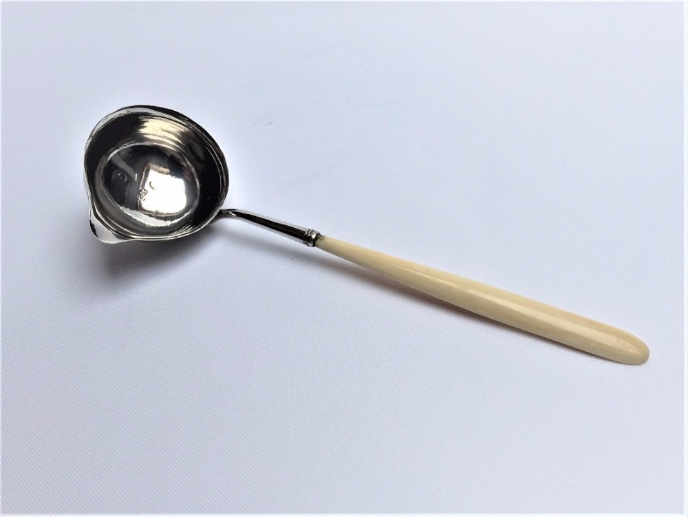 A rare Georgian silver toddy/cream ladle By Elizabeth Morley.