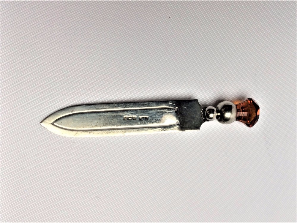 A George V silver & amber thistle bookmark.