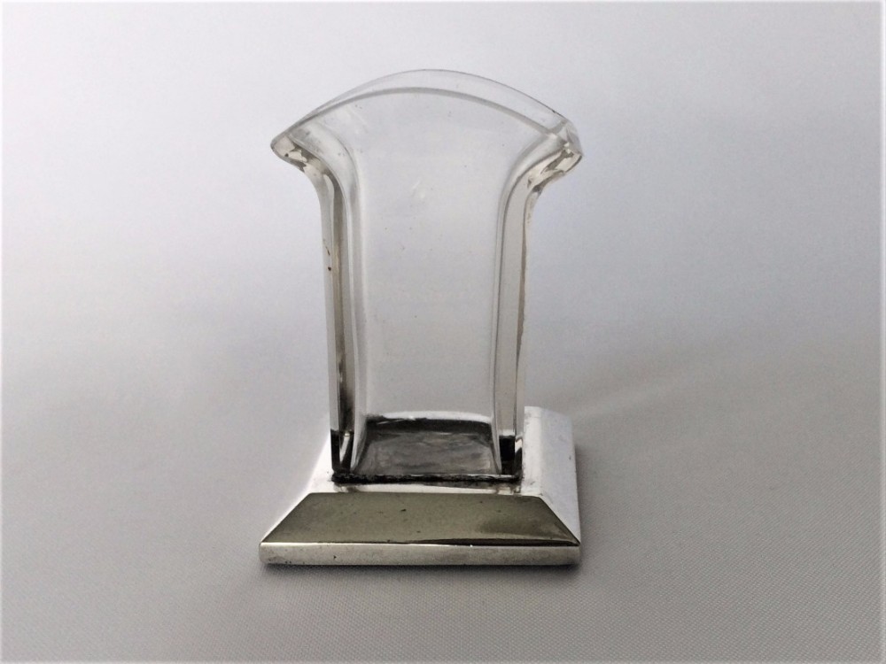 An Edwardian silver mounted cocktail stick holder.