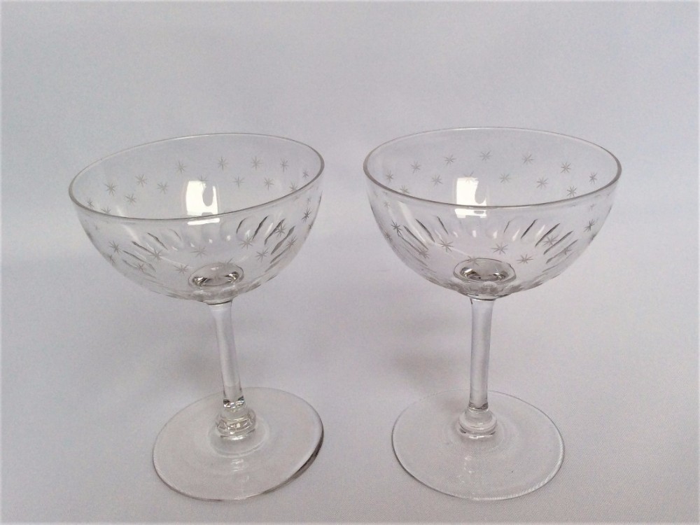 A pair of Victorian star etched and cut champagne bowls.