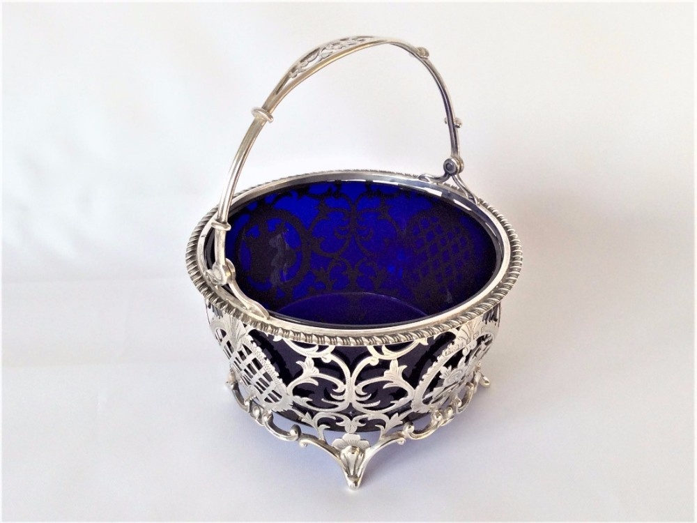 A delightful George V pierced silver basket.