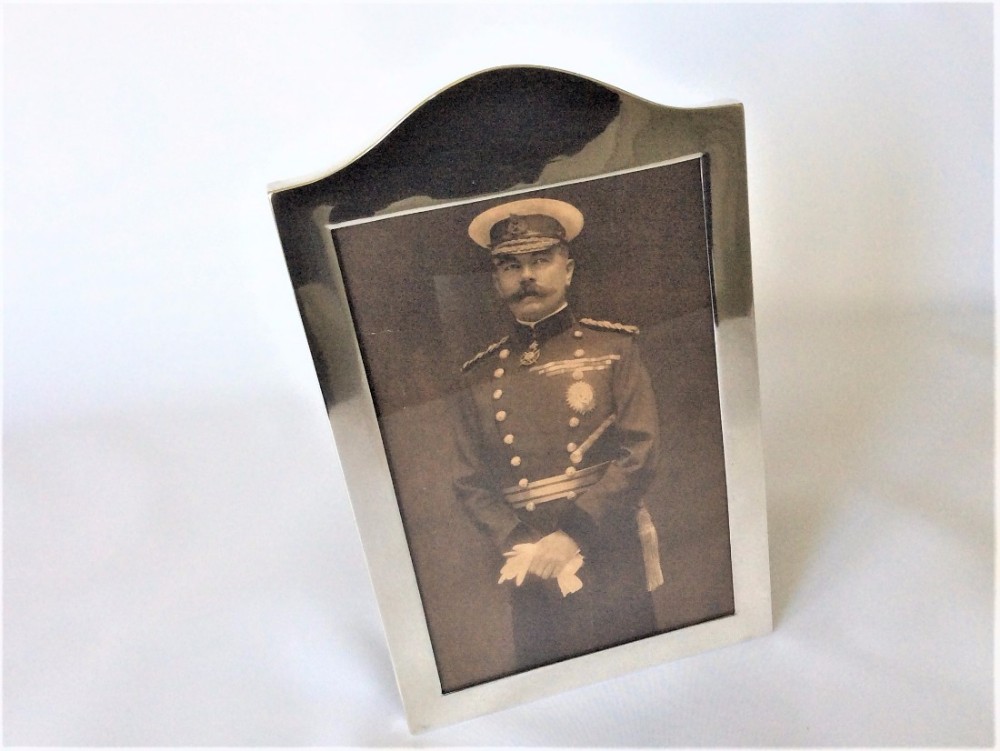 A handsome shaped Edwardian silver photo frame