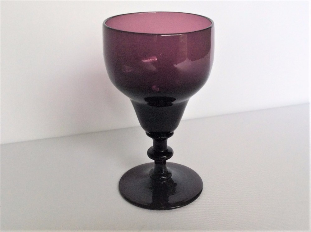 A rare Georgian amethyst wine glass.