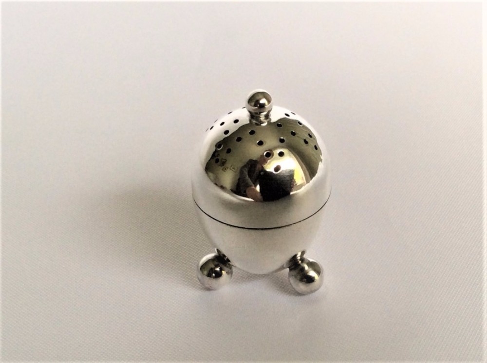 A Chester silver egg pepper pot
