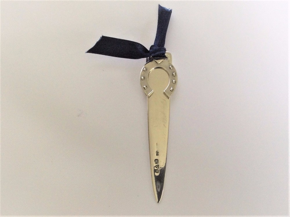 A rare Chester silver horseshoe bookmark.