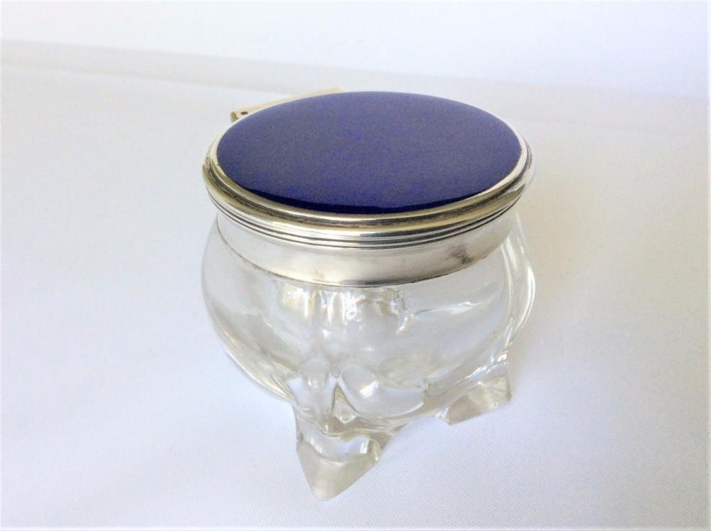 A fabulous silver & enamel inkwell.