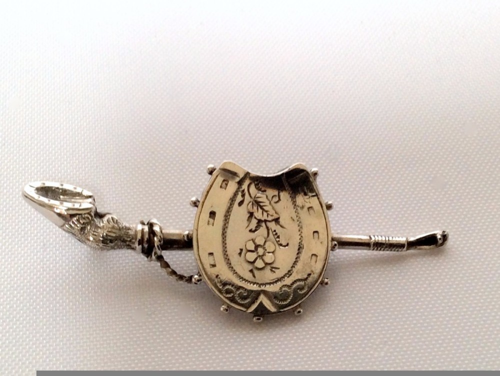 A Victorian 'Horse rider's' silver brooch.