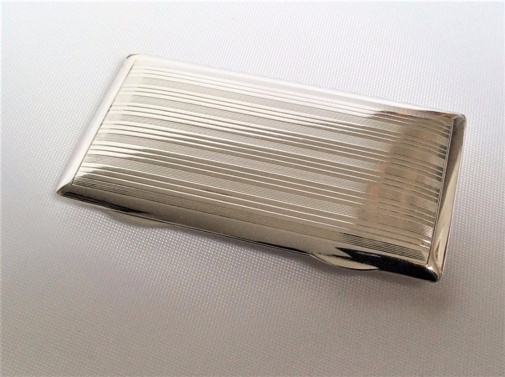 A fabulous Samson Morden sprung silver card case.