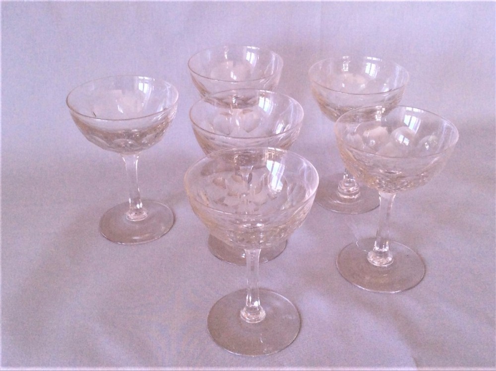 A set of six Victorian cut champagne glasses.
