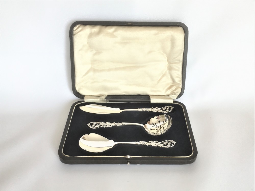 A charming pierced silver afternoon tea set.
